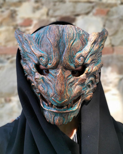 Front view of handcrafted Oni mask with captivating oxidized colors